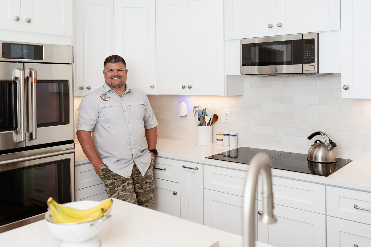 ICS Home & Commercial team member in a finished kitchen