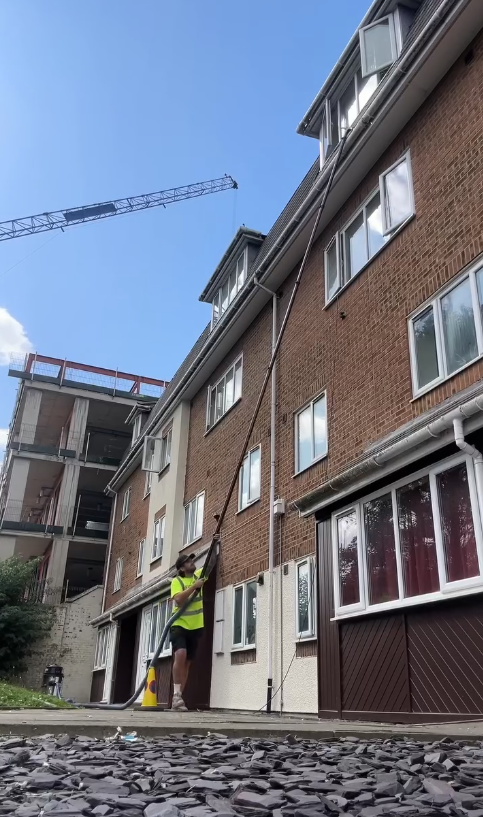 Professional gutter cleaning service in residential area