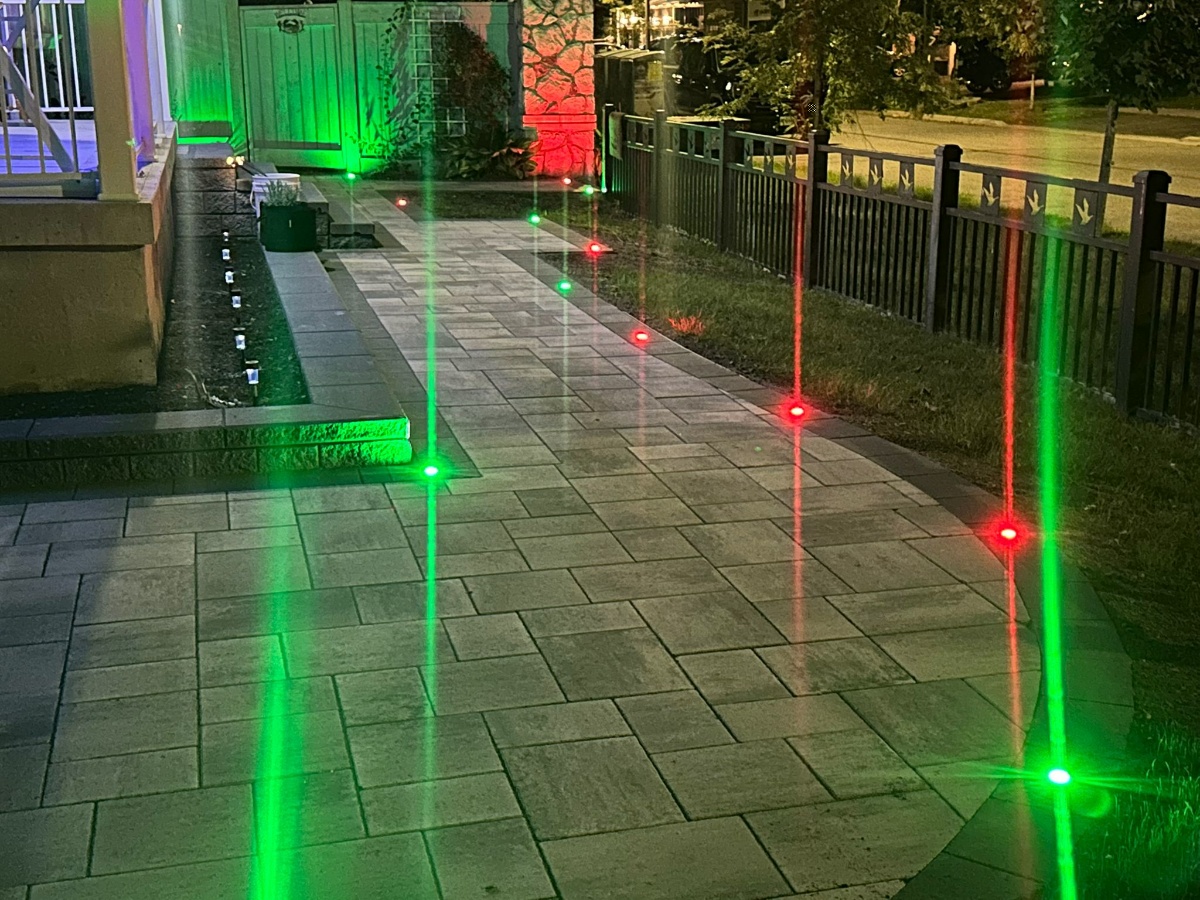 Decorative aluminum fence installation in Calgary with custom leaf pattern