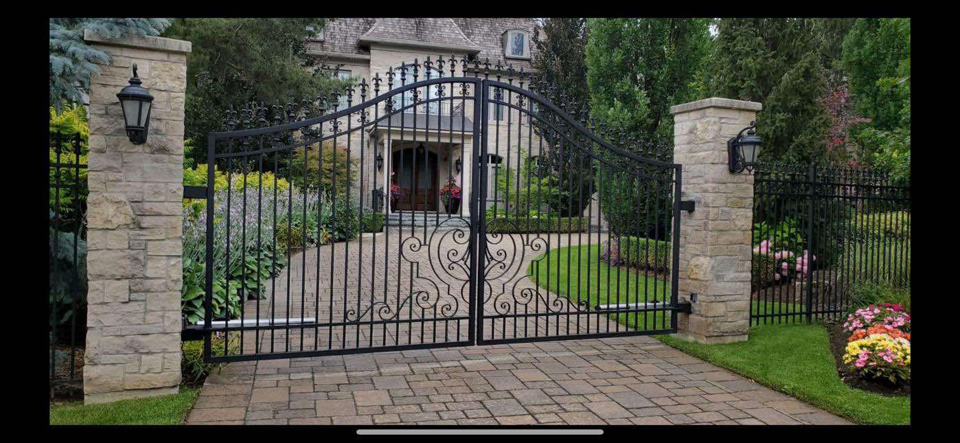 Custom automated gate installation Mississauga — smart motorized driveway gate by Iron Ring Fencing