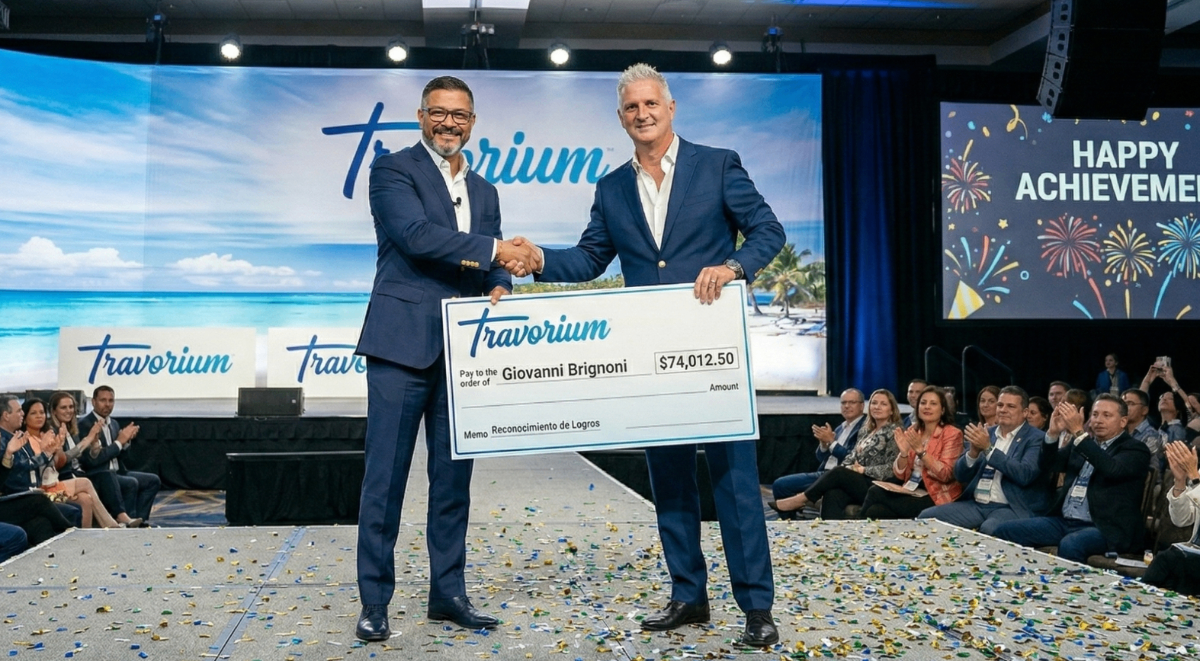 Giovanni Brignoni con cheque de $74,012.50