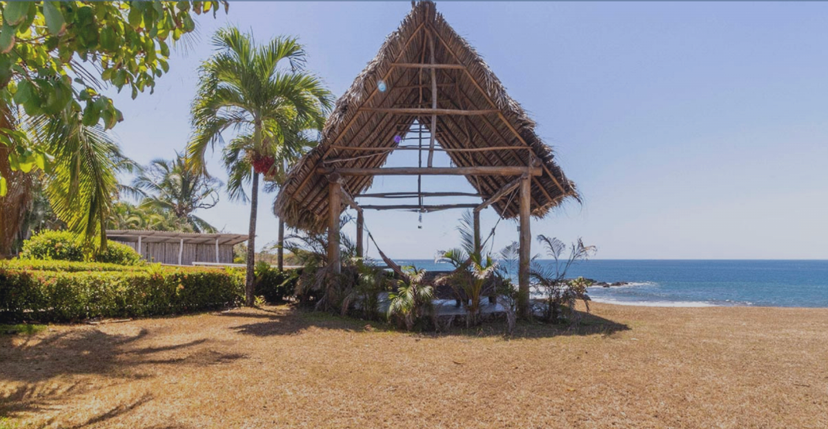 Beachfront palapa with ocean view