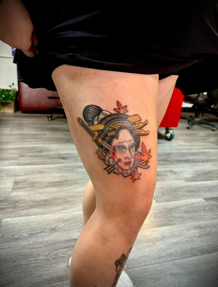 Japanese-inspired geisha with autumn leaves