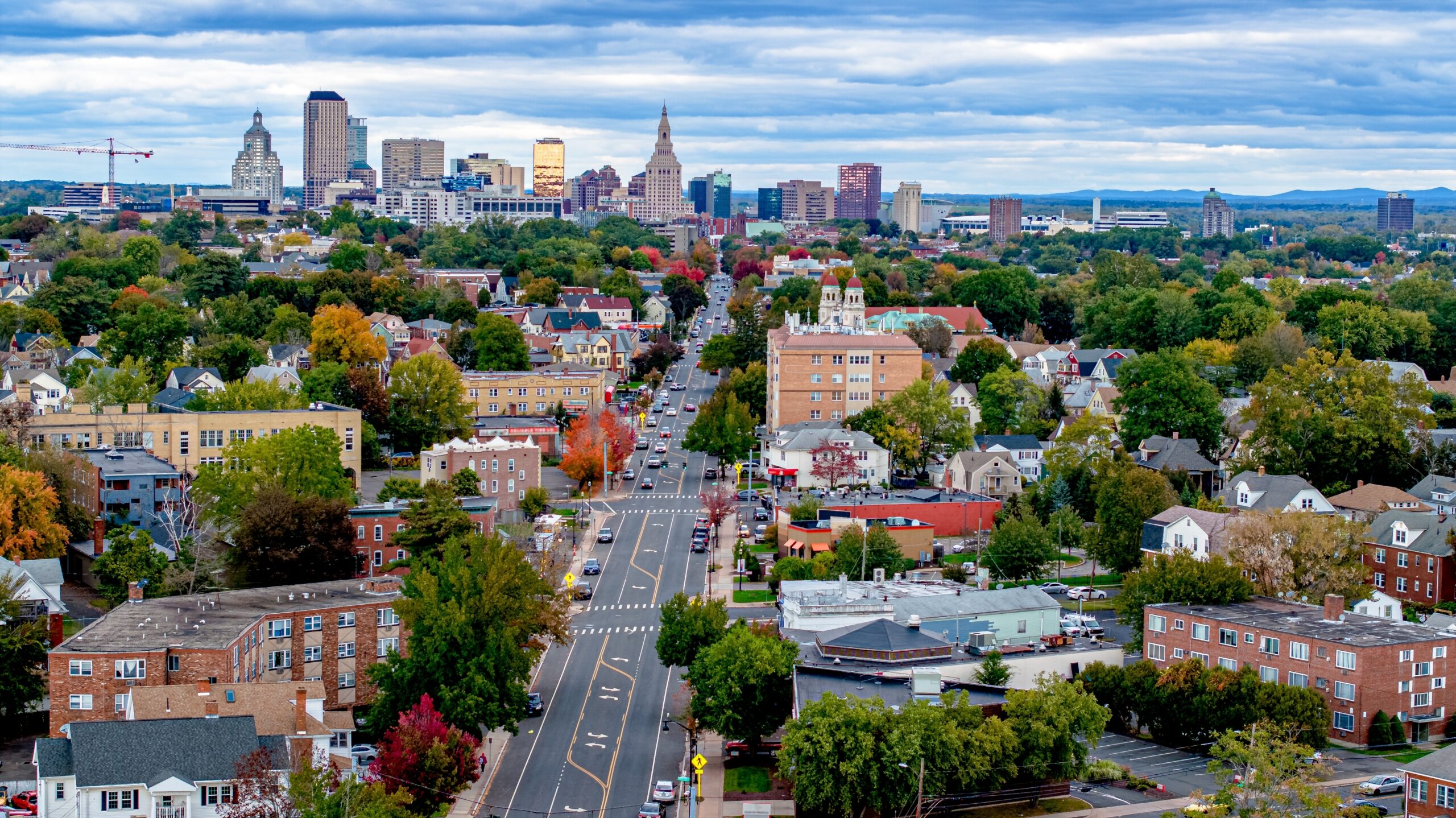 Professional caregiver assisting senior in Connecticut home