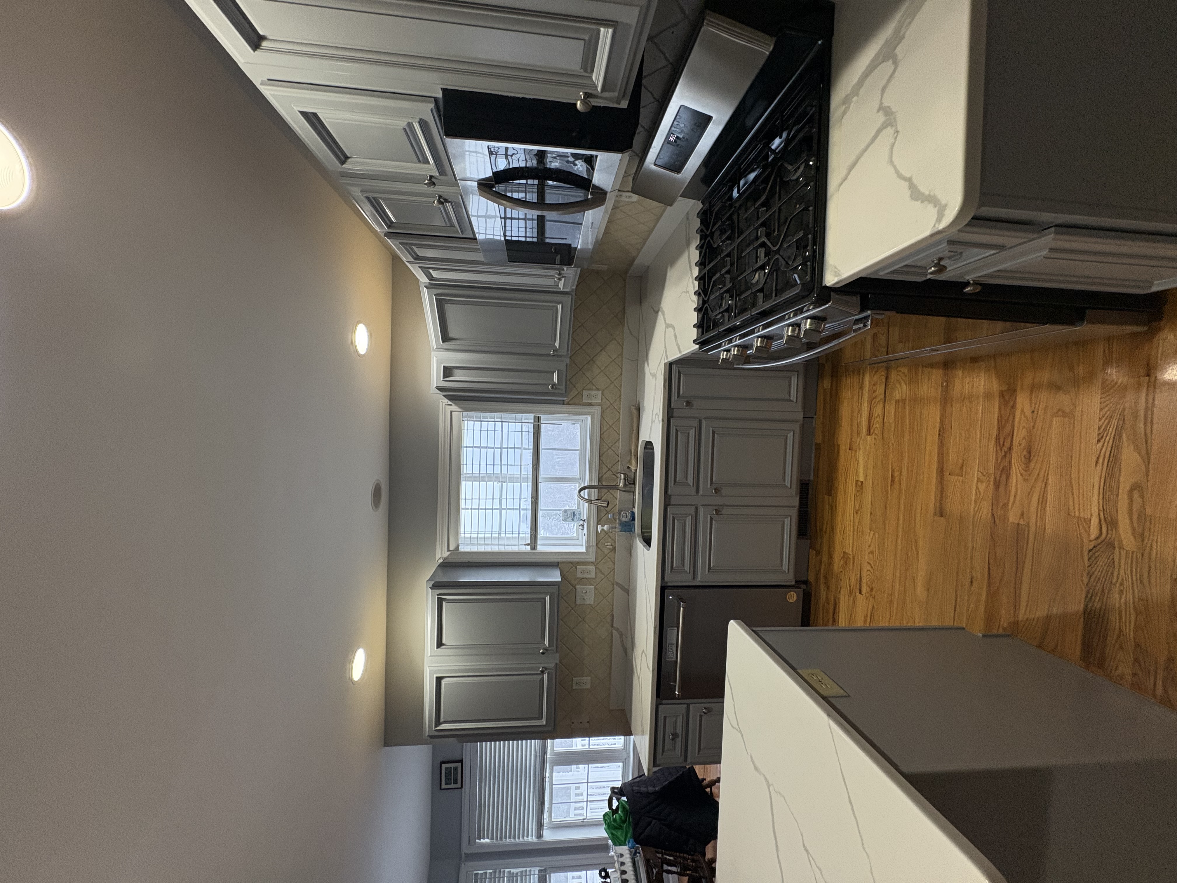 Kitchen cabinet refinishing with factory-quality spray finish in Greenwich, CT — Almeida Painting CT