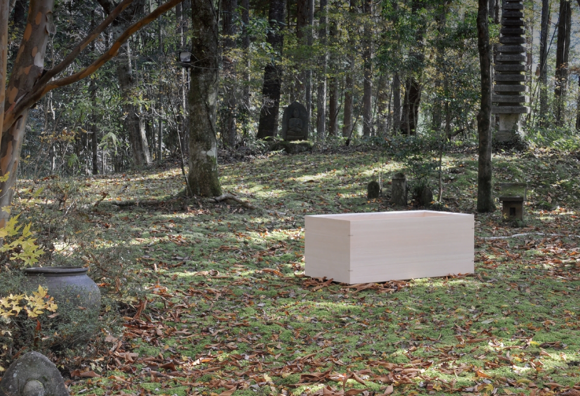 Outdoor hinoki bath in Japanese garden setting