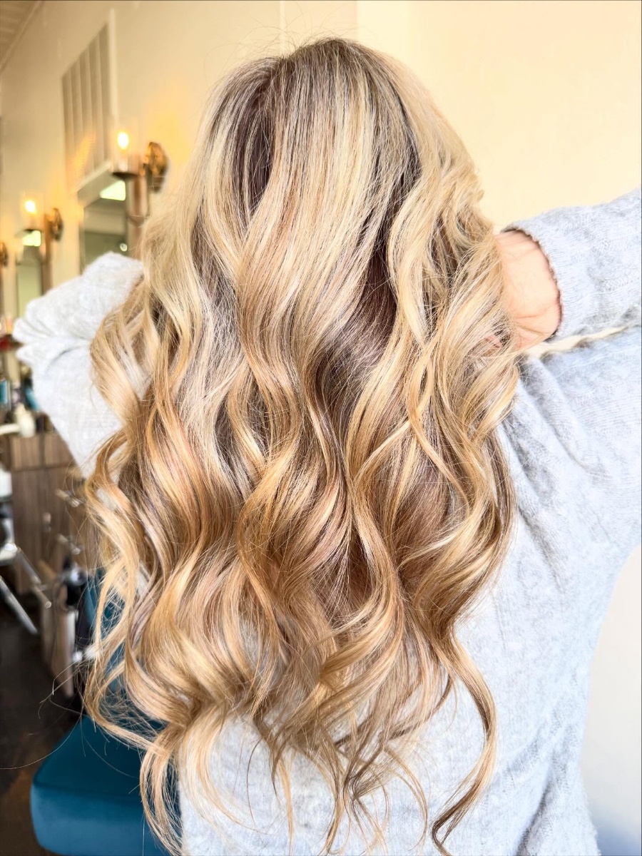 Expert hair stylist at work at Girasolé Salon, Babylon NY