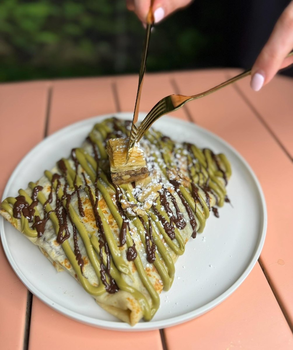 Delicious sweet crepe with fresh strawberries and Nutella at Sugar Bae Cafe in Hicksville NY - handcrafted desserts and bubble waffles