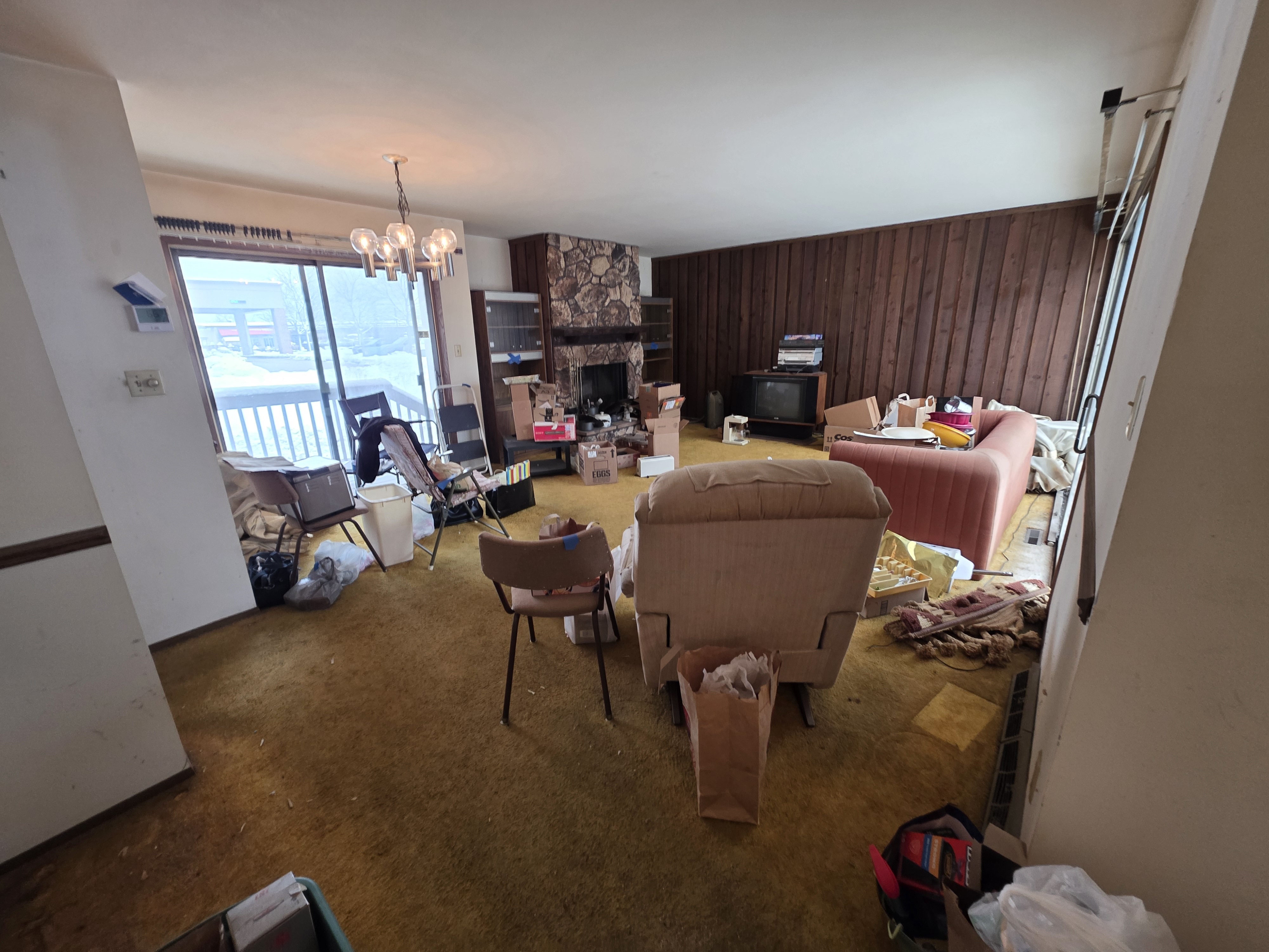 Before estate cleanout Plymouth WI — cluttered home interior