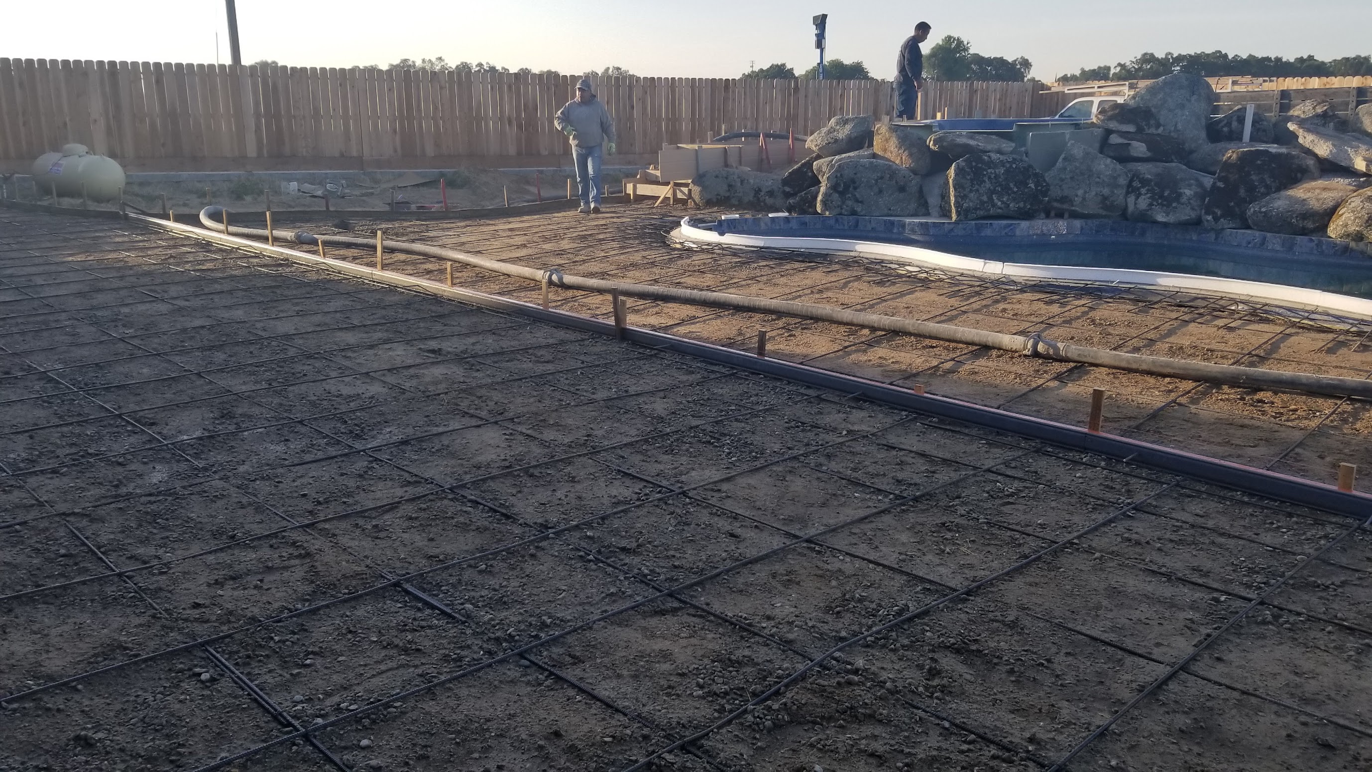 Stamped concrete driveway with circular design in Manteca, CA