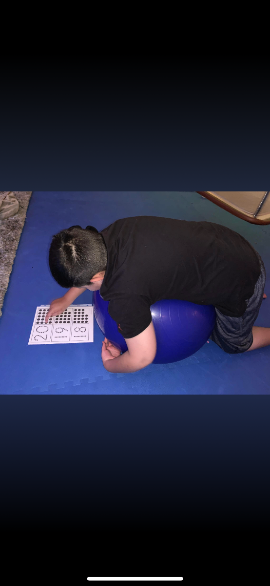 Multi-sensory learning environment 2 Child using sensory regulation tools successfully