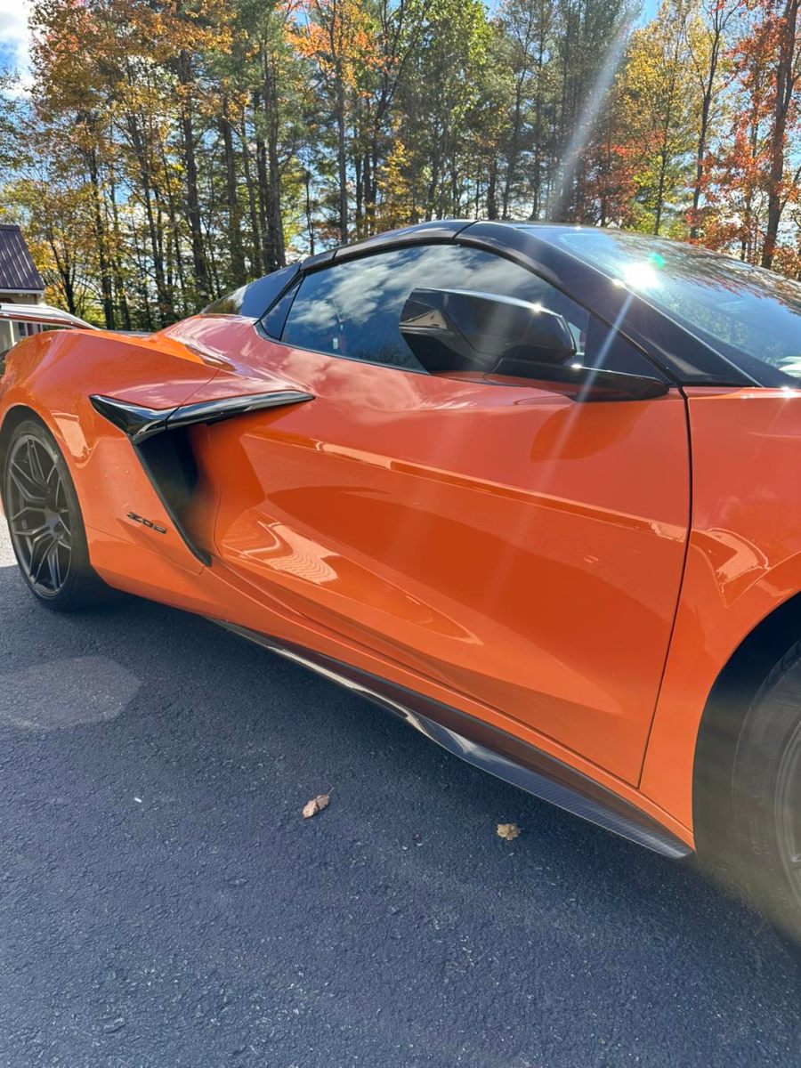 Orange Corvette Z06 with ceramic coating showing perfect gloss