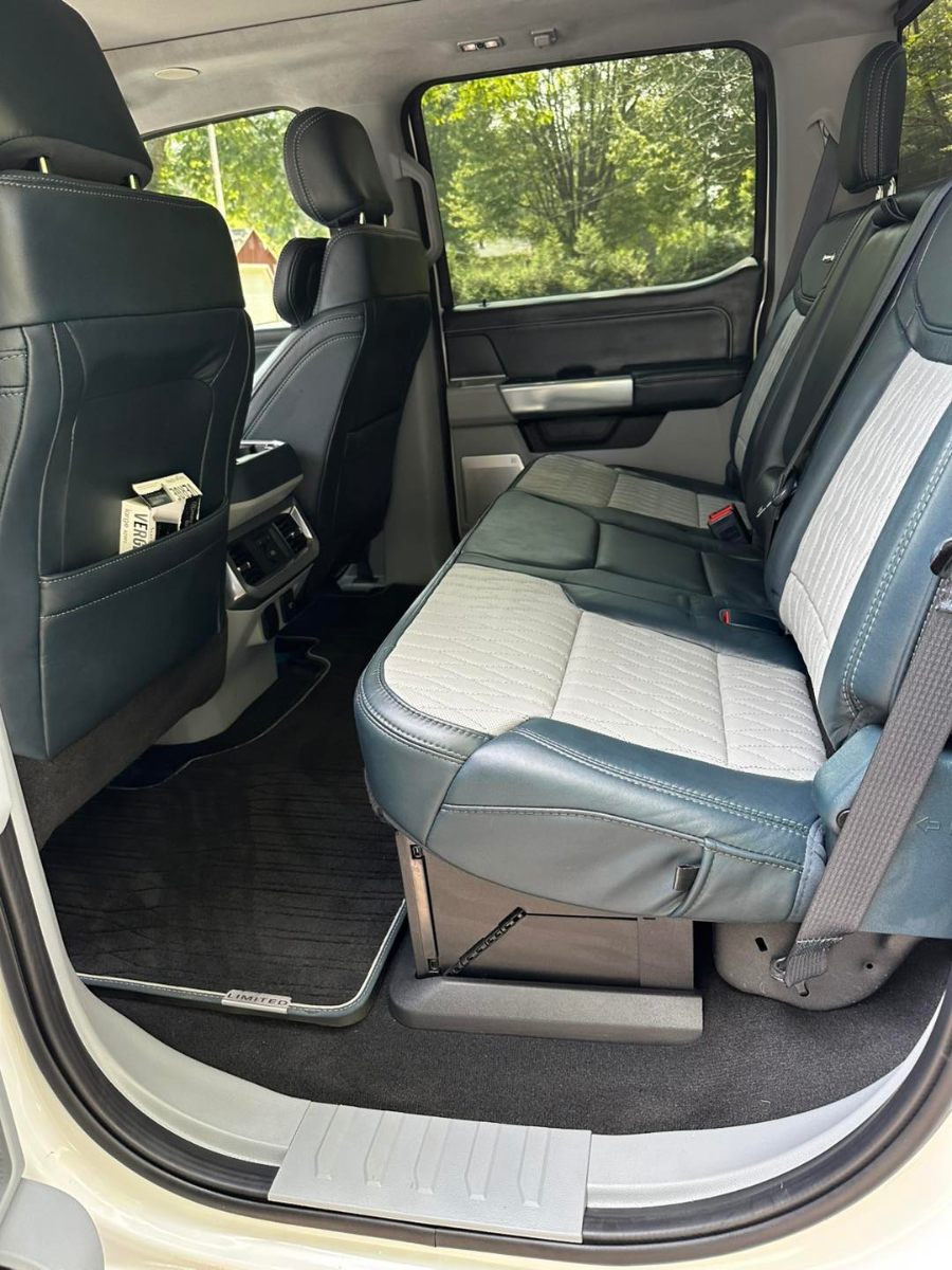 Ford F-150 Limited rear seat interior detailing with pristine leather and clean floor mats