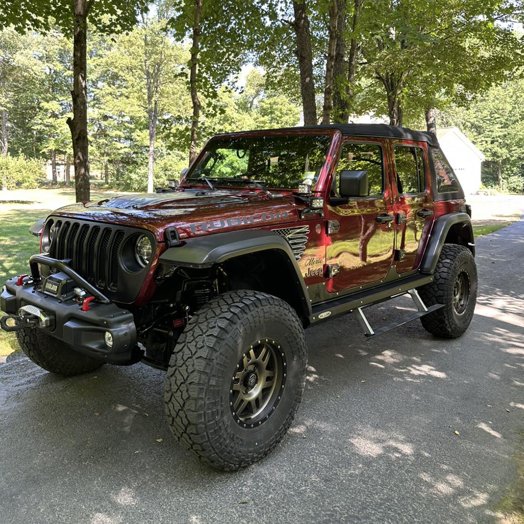 Burgundy Jeep Rubicon with mirror-like ceramic coating finish by Jarvis Detailing in Perkinsville