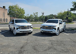 Twin Chevy Silverados tinted at Sunstate Window Tinting