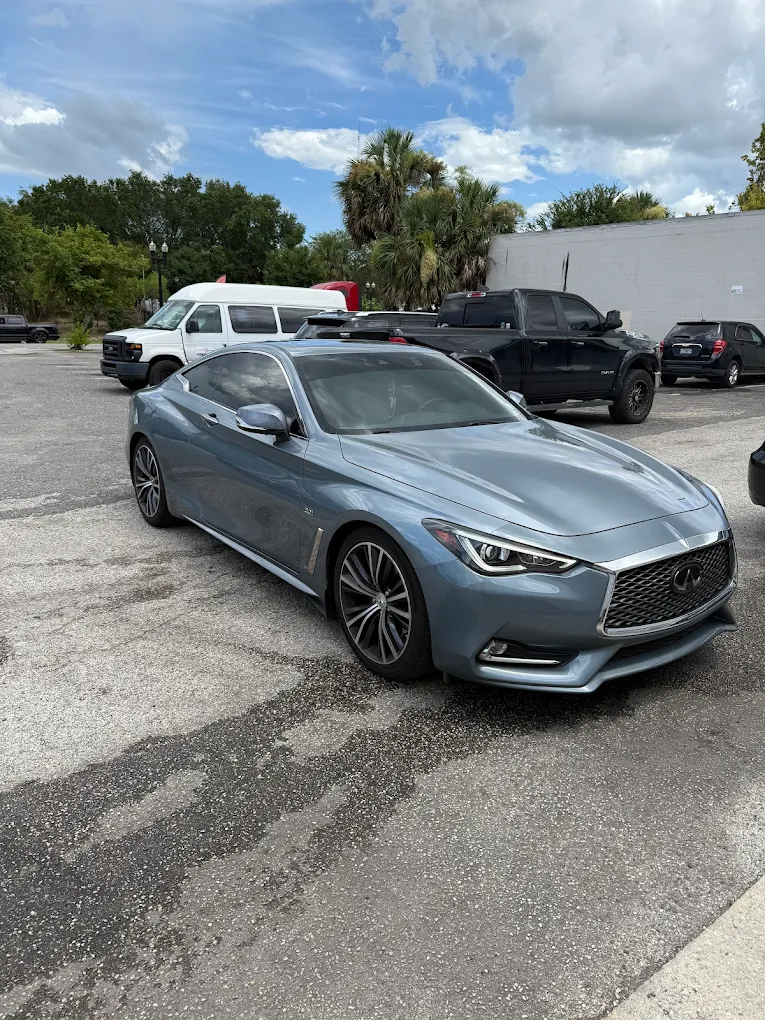 Infiniti Q60 tinted at Sunstate Window Tinting