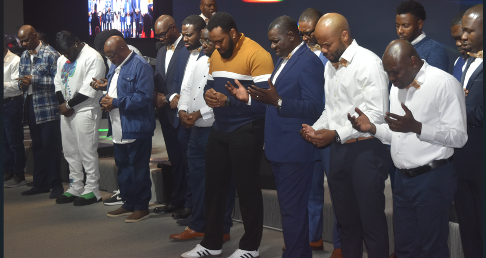 RCCG Mesa congregation in prayer
