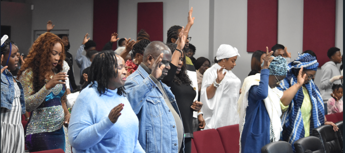 RCCG Fountain of Life congregation worship