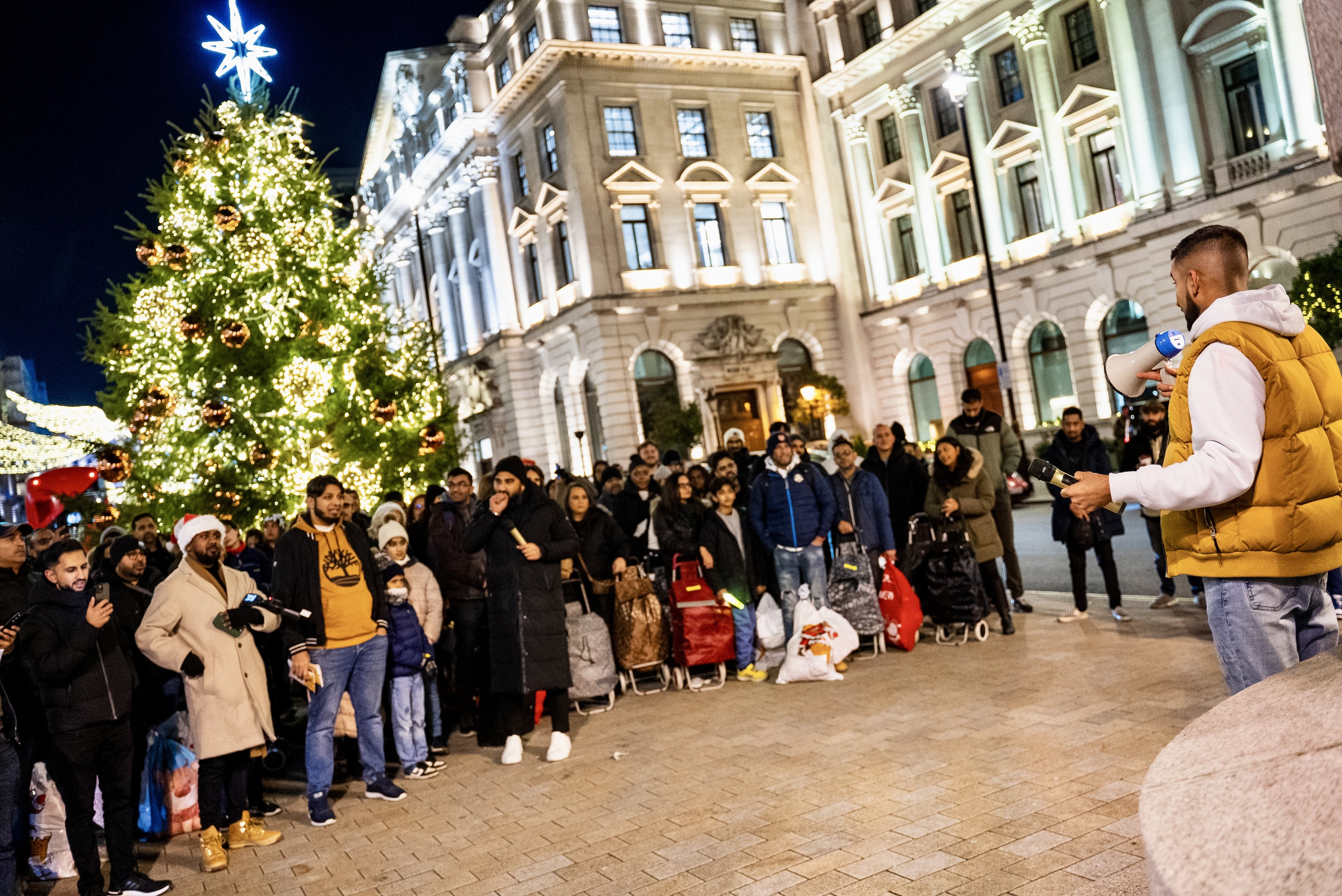 Amish speaking at an event