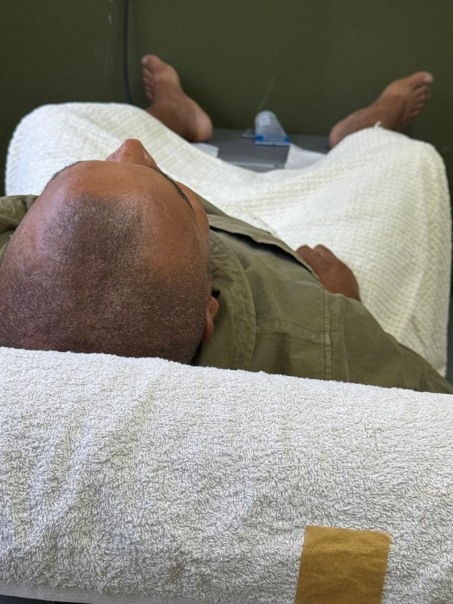 Patient receiving a hands-on treatment session at Arise & Shine Lifestyle Centre