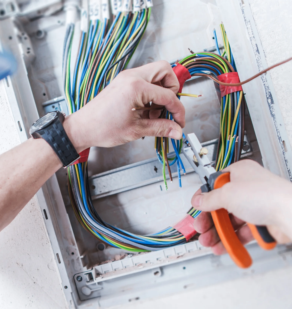 Commercial electrician at work