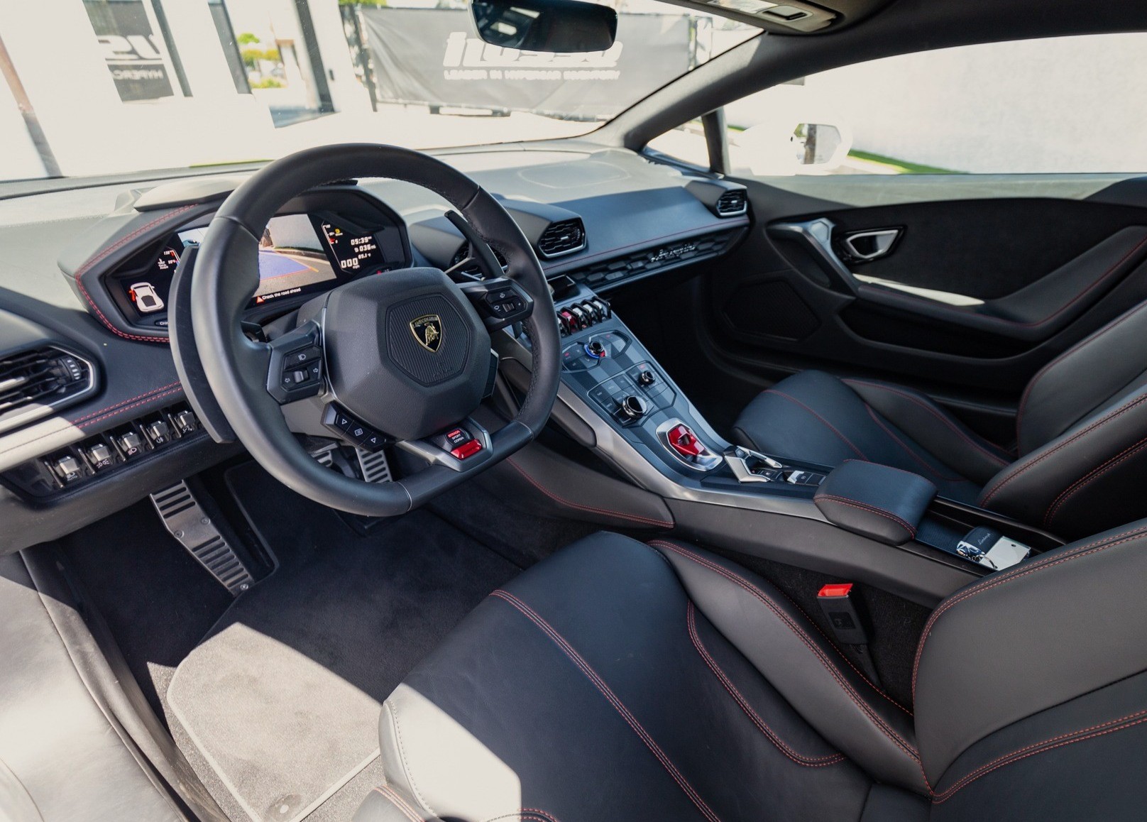 Luxury vehicle interior deep cleaning and conditioning service showing pristine leather seats and dashboard in Glen Burnie Maryland