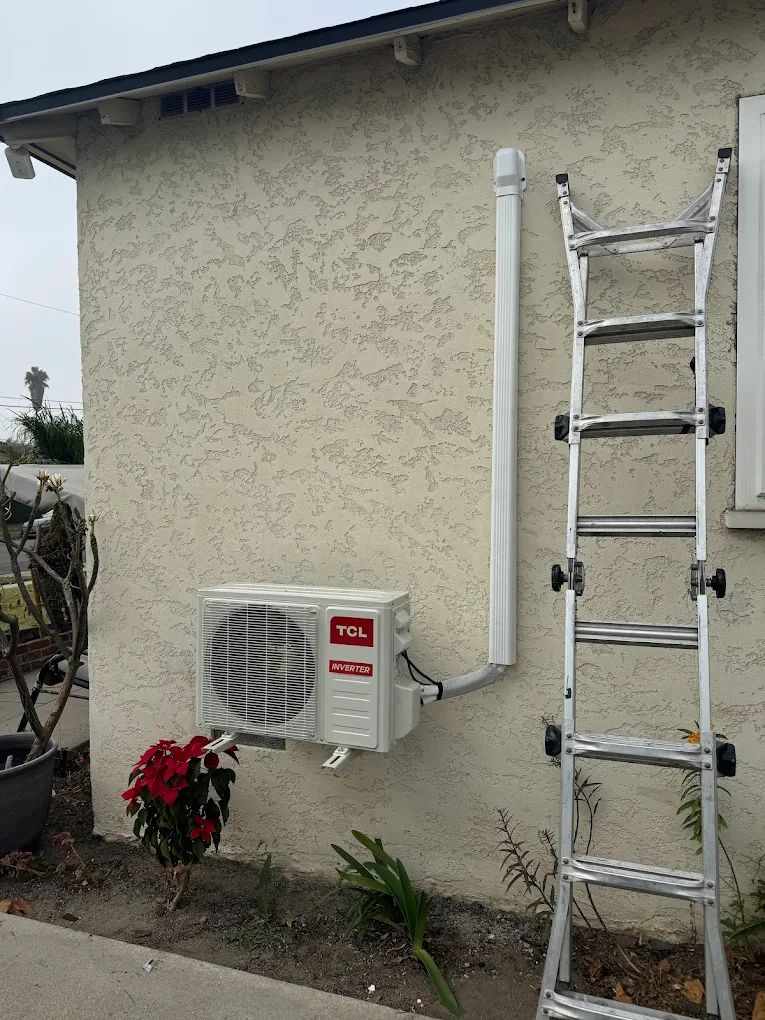 TCL inverter mini-split outdoor unit installed on house wall