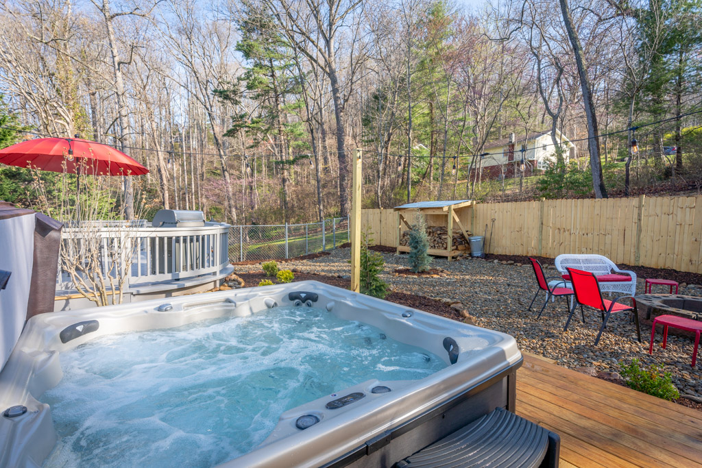Family enjoying hot tub at mountain retreat