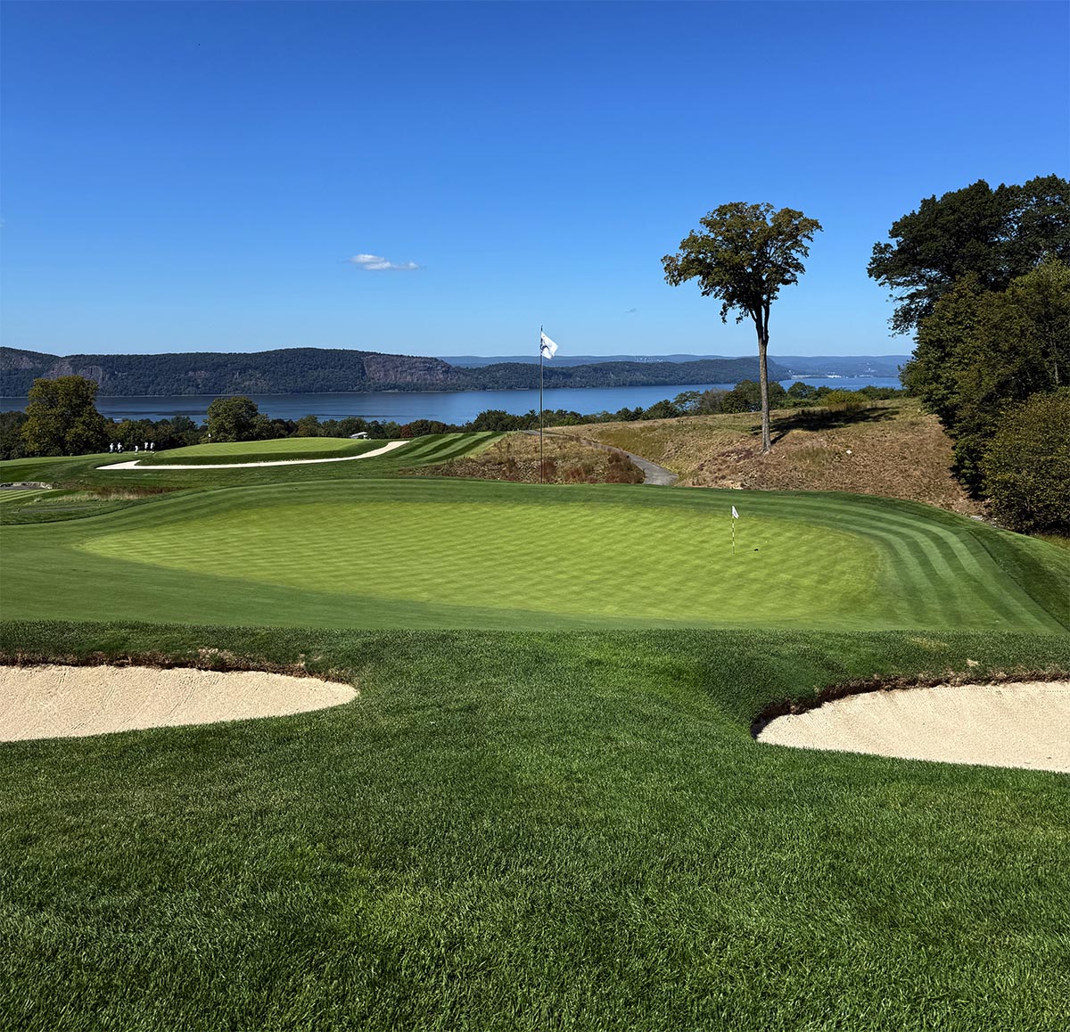 Golfers enjoying a premium golf experience on a world-class course, representing the exclusive community and unforgettable moments that Bucket List Golf creates