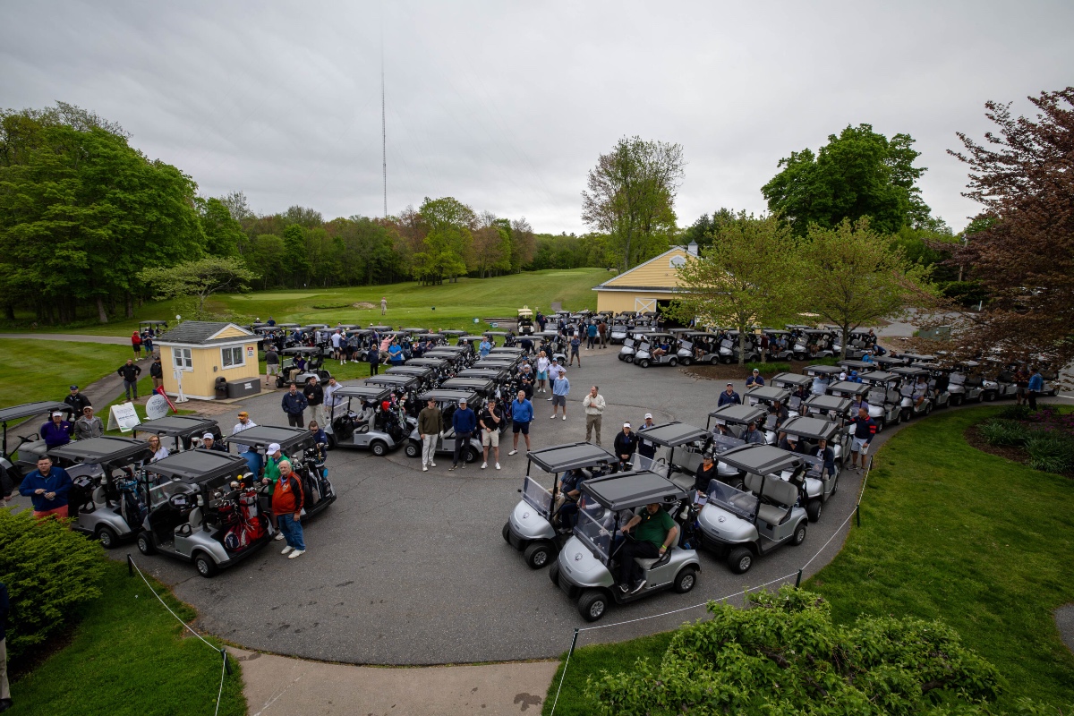 Veterans enjoying golf together, representing the community and support that Bucket List Golf provides through its partnership with Veterans Inc