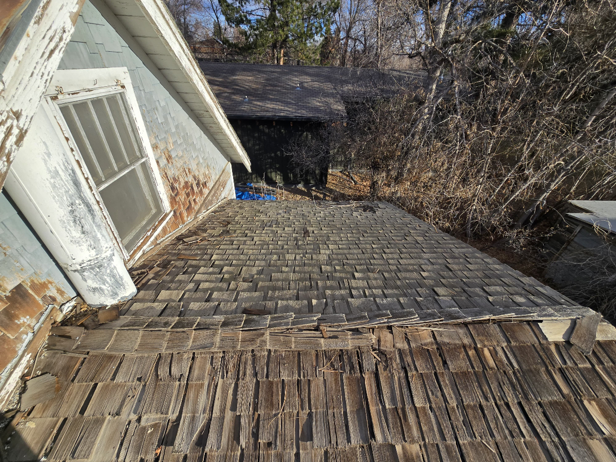Old deteriorated wood shake roof