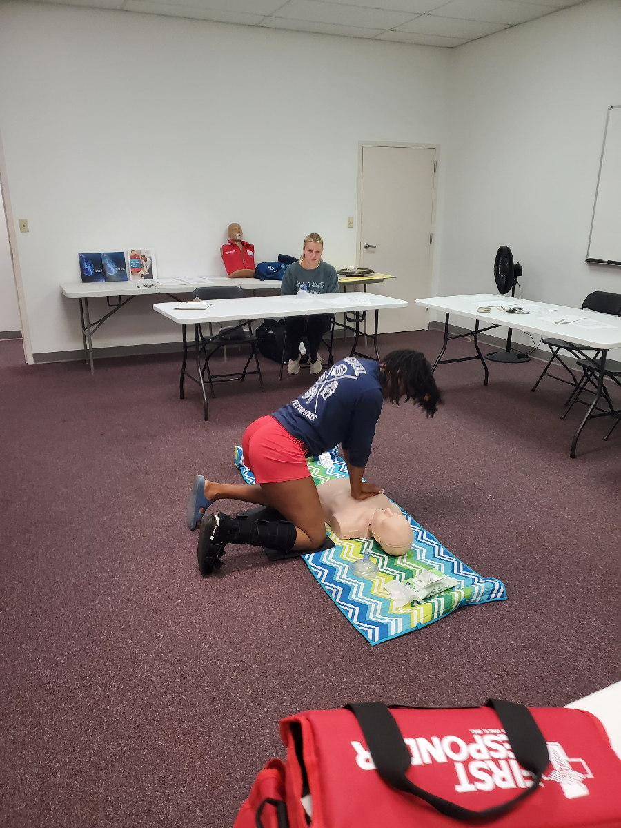 CPR students practicing life-saving techniques