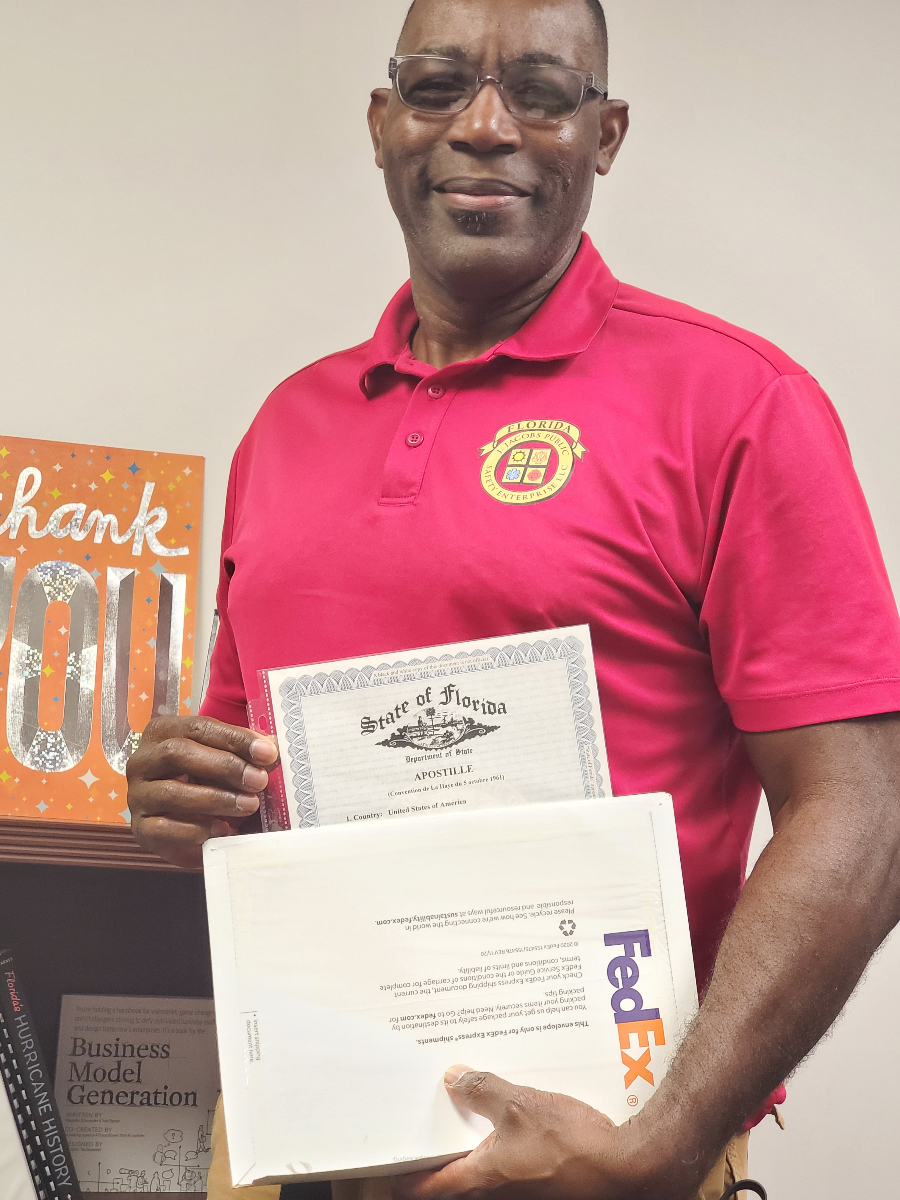 Notary Nexus specialist holding official Florida State Apostille certificate and FedEx delivery package