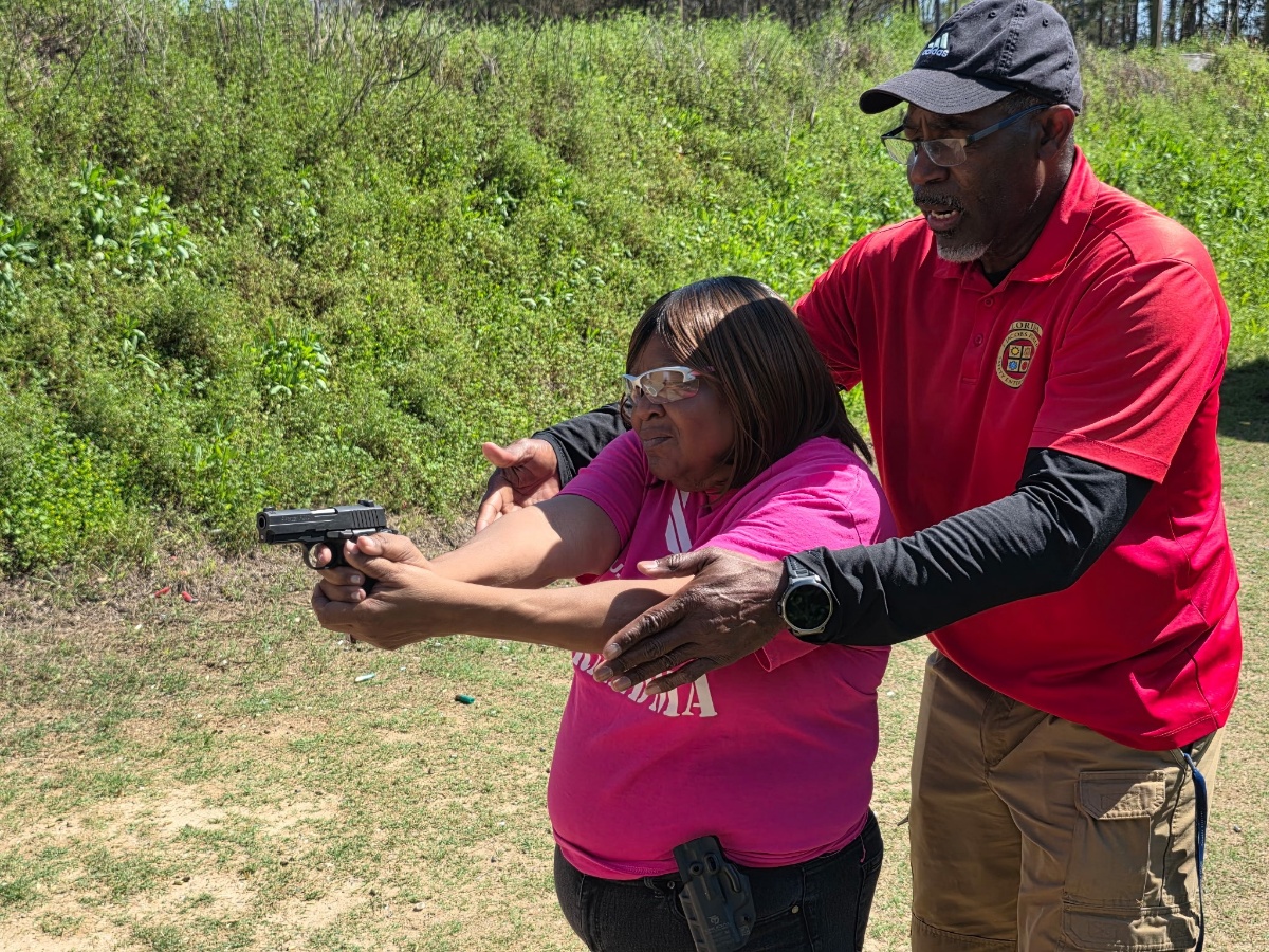 Chief Jacobs coaching student at the range