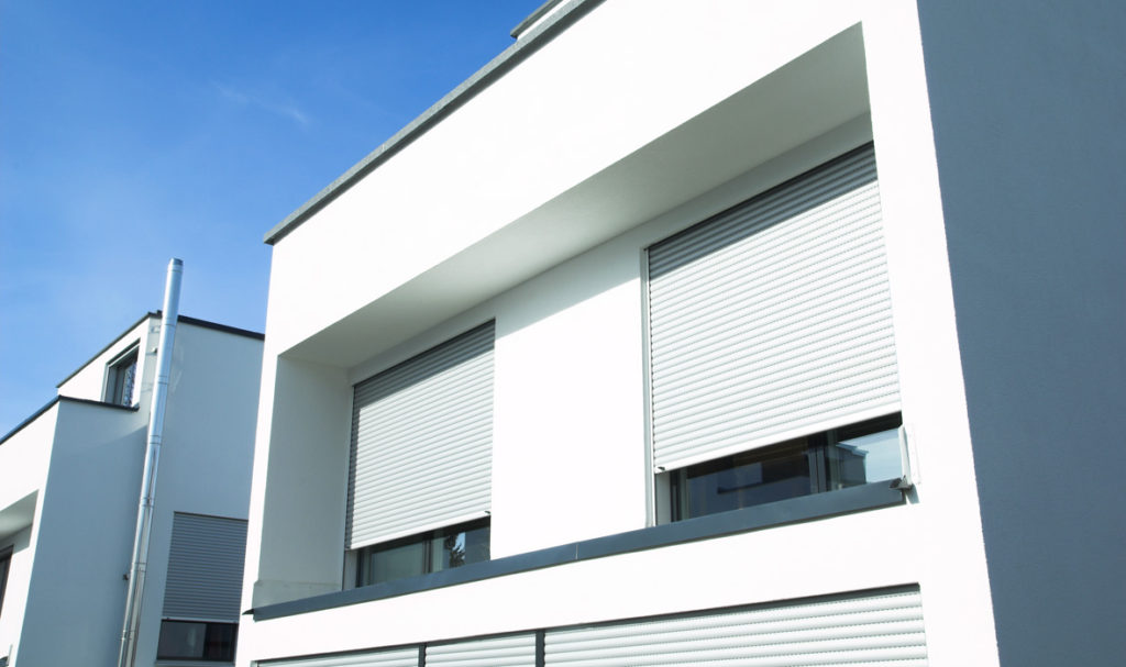 Impact windows versus hurricane shutters comparison