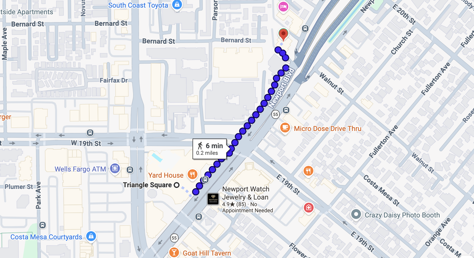 Walking route from Triangle Square parking to Kingdom Coffee Houses along Newport Boulevard