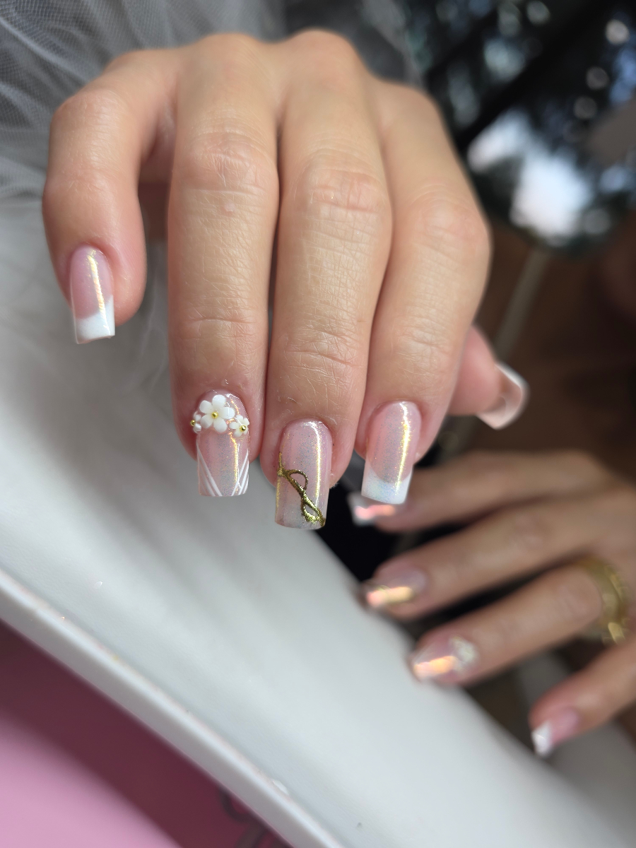 Creative artistic nail design featuring unique patterns and vibrant colors with professional execution