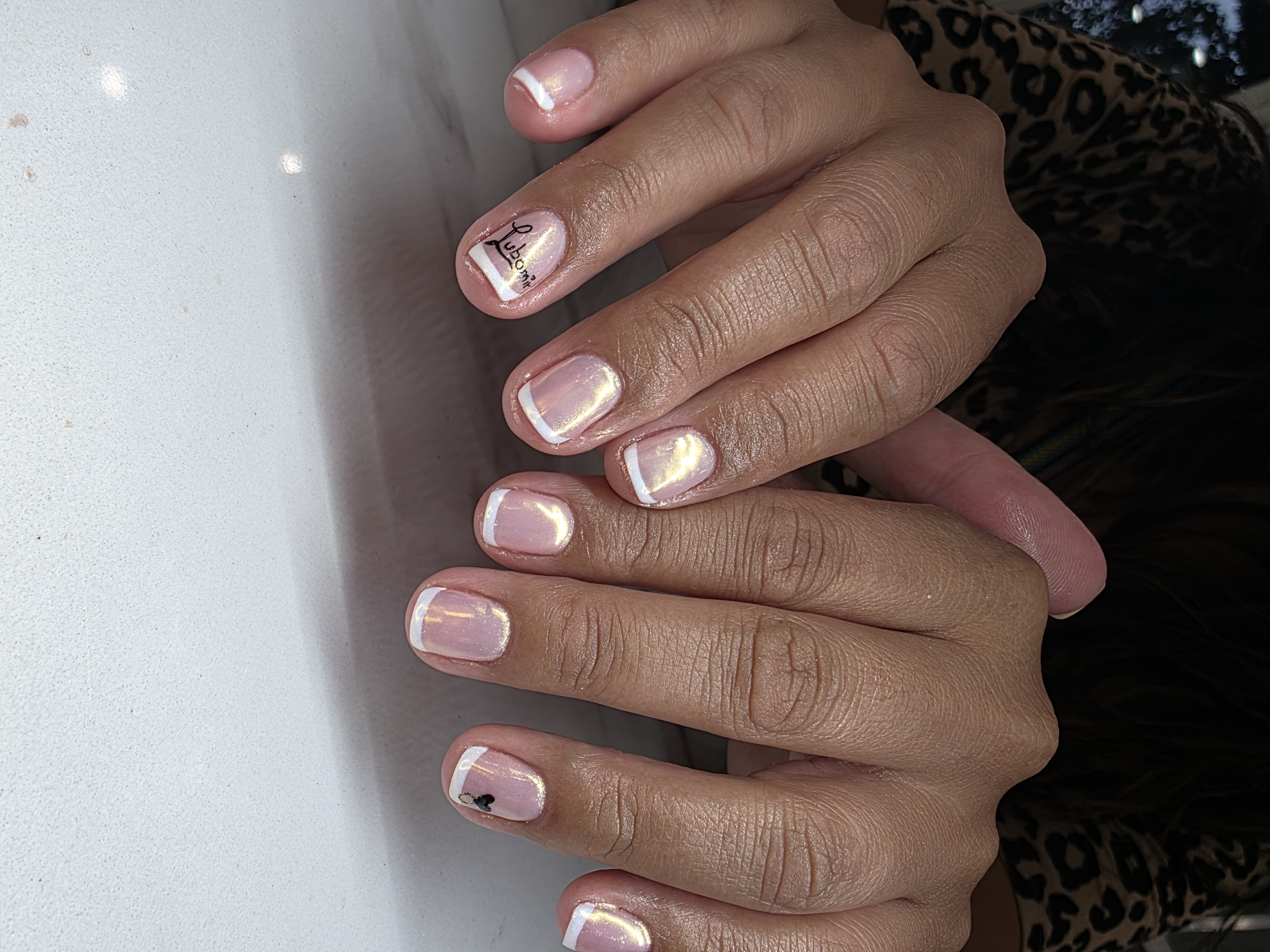 Timeless classic French style manicure demonstrating traditional elegance and professional nail artistry