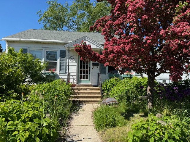 Cottage Front with Blooming Garden