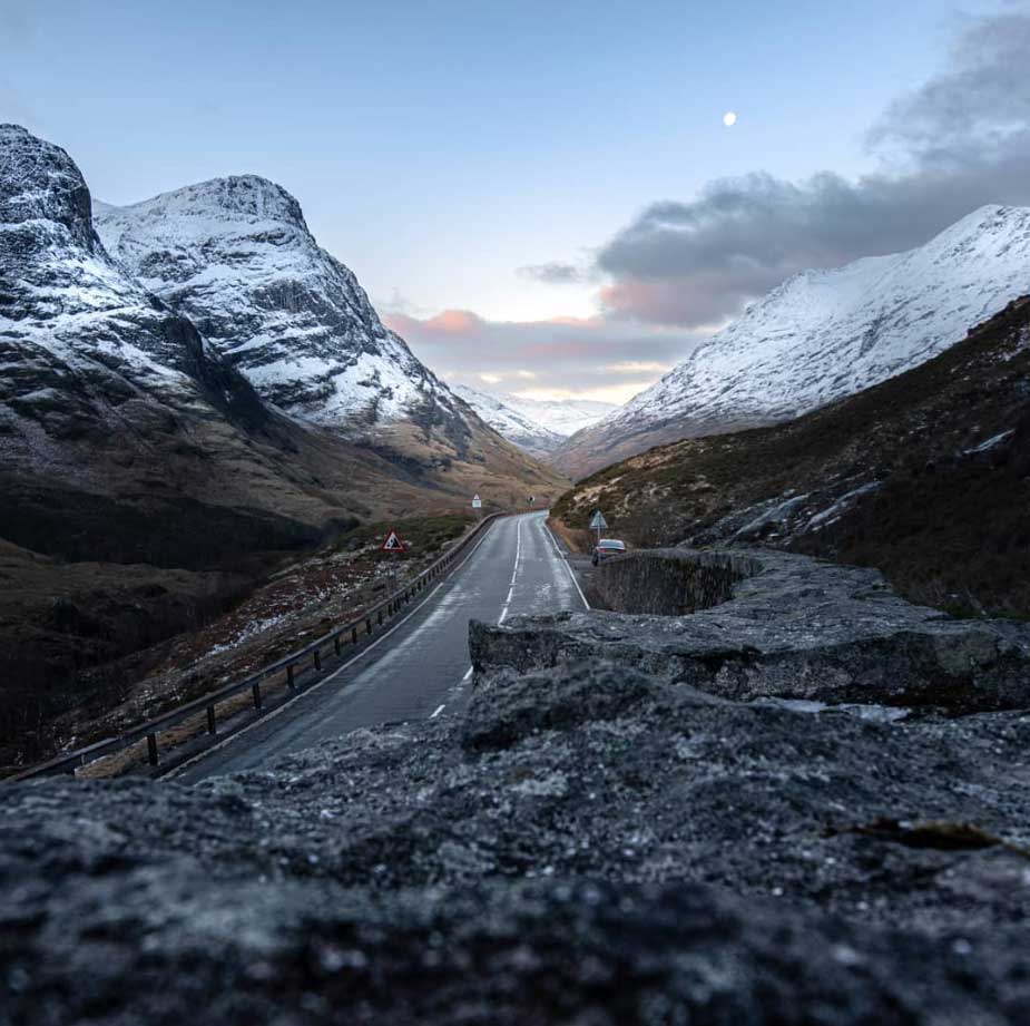 Scottish Highland landscape — portfolio hero banner showing dramatic misty mountains at sunrise