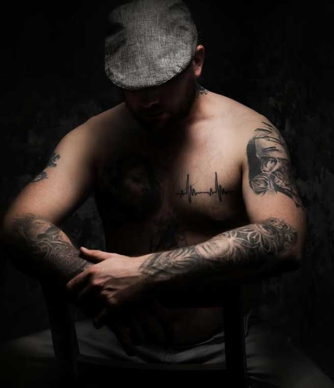 Fine art portrait photography Scotland — woman in soft natural window light, shallow depth of field