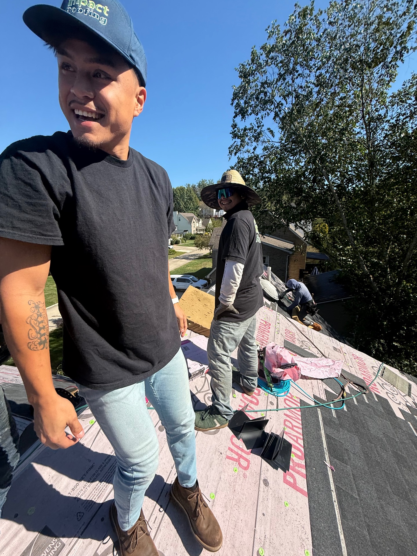 Roofing crew — residential shingle installation
