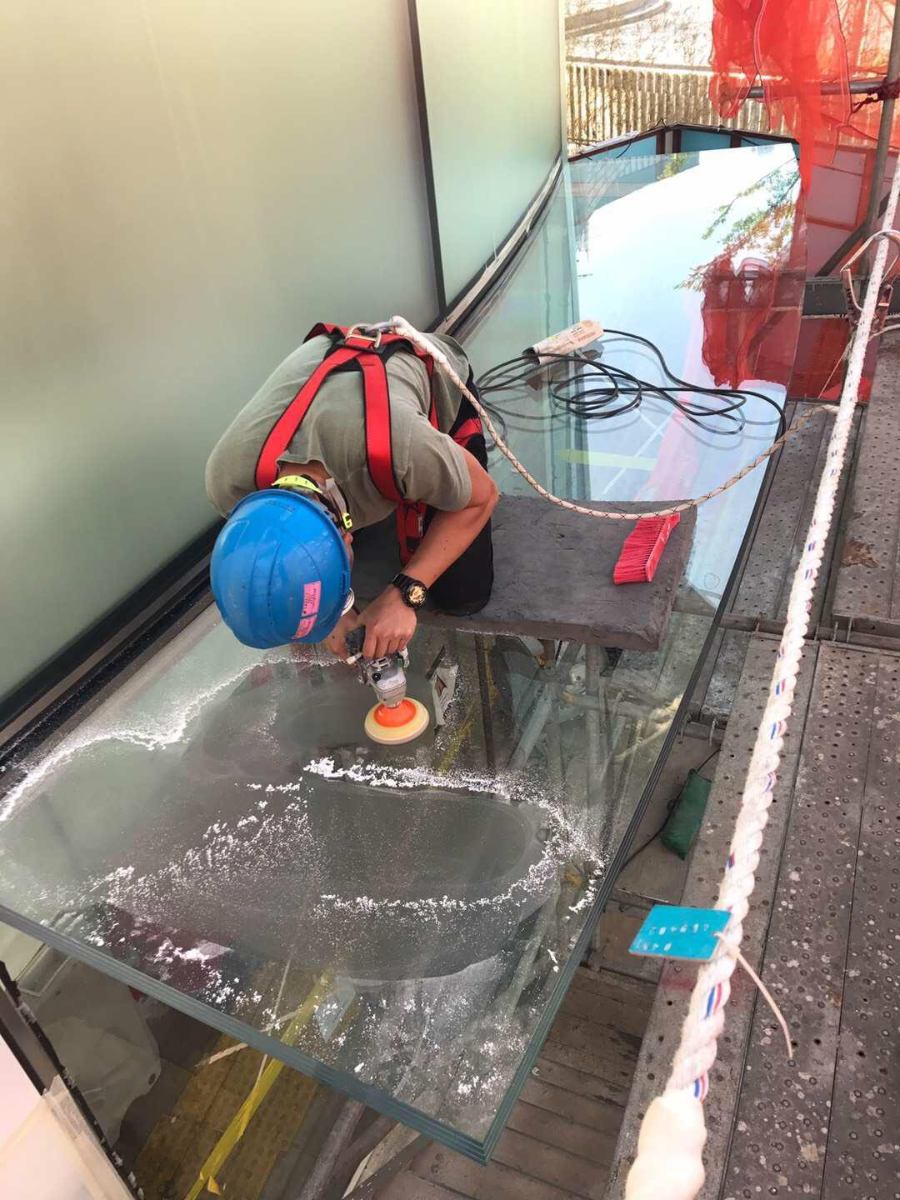 Glass Repair Services - Professional technician repairing glass