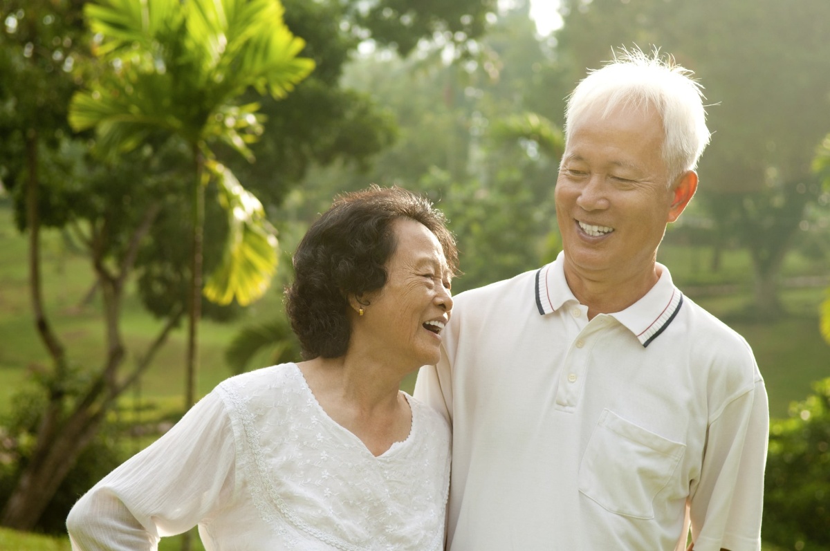 Happy elderly couple enjoying outdoors in Singapore