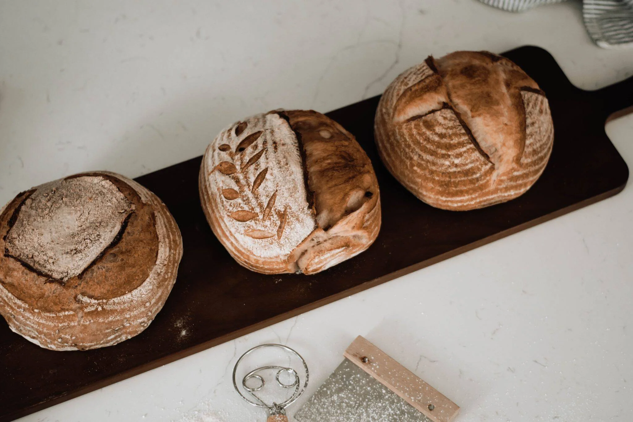 Luv Bakery artisan sourdough shared at a family table in Fishers Indiana