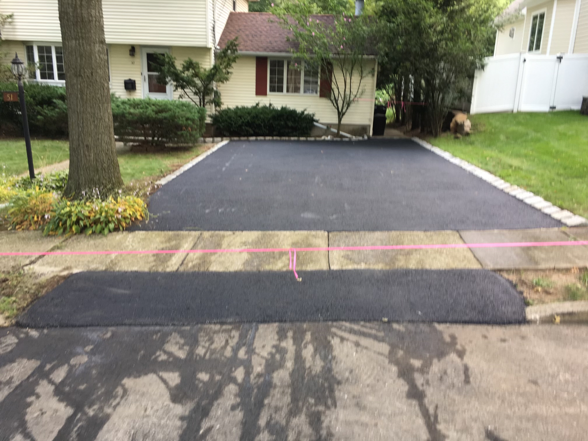 Asphalt Driveway with Paver Border