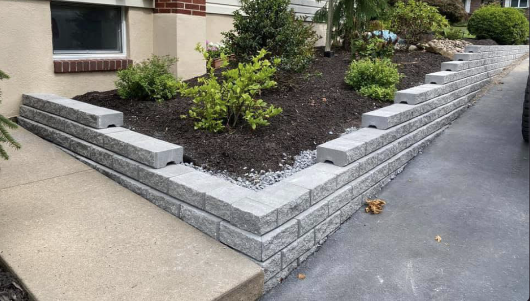 Why Retaining Walls Are One of the Best Investments for Sloped Properties