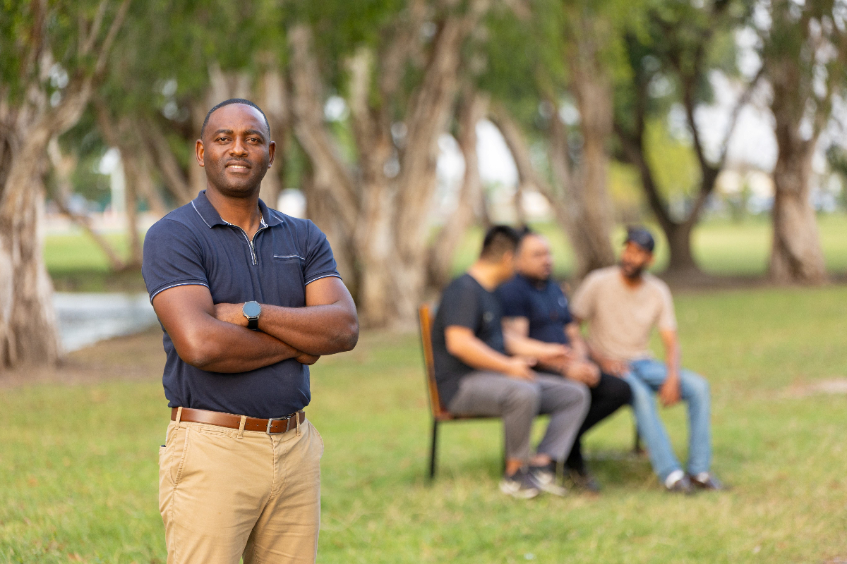 Men supporting each other