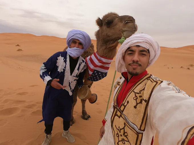Birthday message written in golden Saharan sand