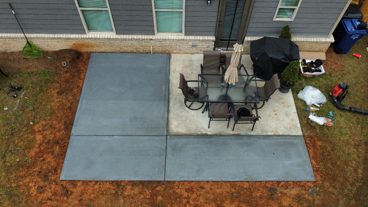 Concrete patio expansion in Loganville GA by Greenstone Landscaping LLC